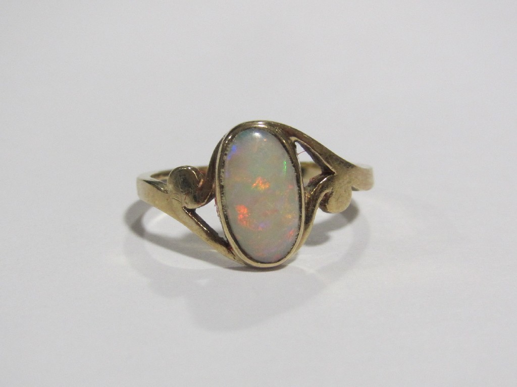 Appraisal: Nine carat rose gold oval cut opal single stone ring