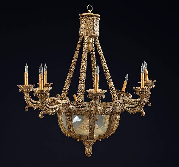 Appraisal: An Italian Neoclassical style giltwood eight light chandelier En suite