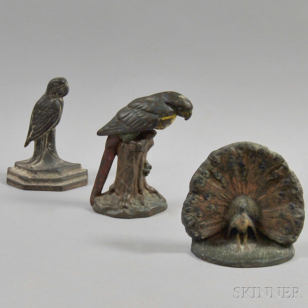 Appraisal: Three Cast Iron Bird Doorstops two parrots one polychrome and