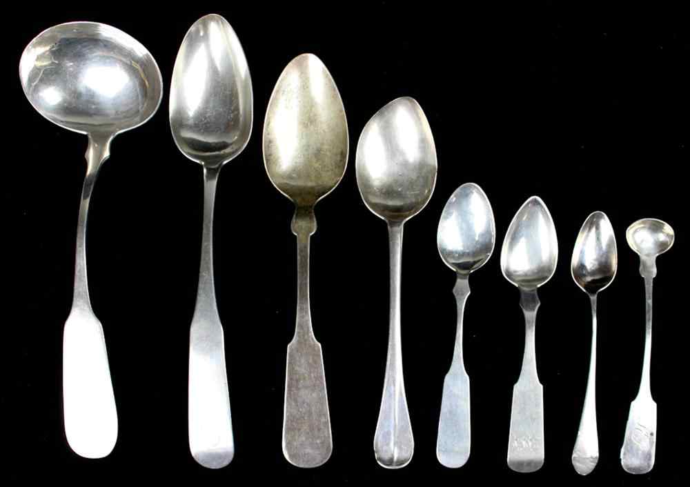 Appraisal: GROUP OF EIGHT AMERICAN COIN SILVER FLATWARE Including a ladle