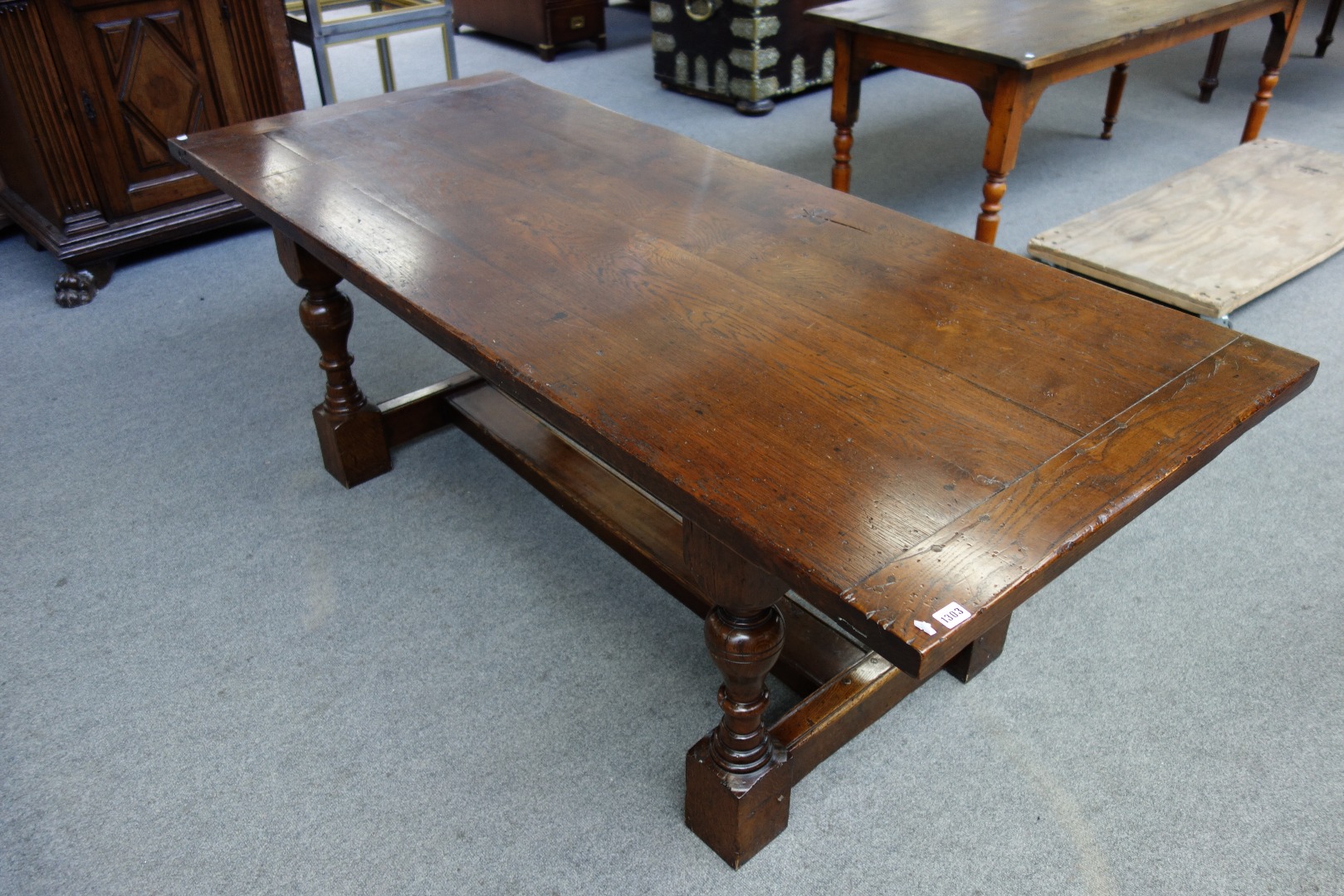 Appraisal: A th century style oak refectory table the cleated plank