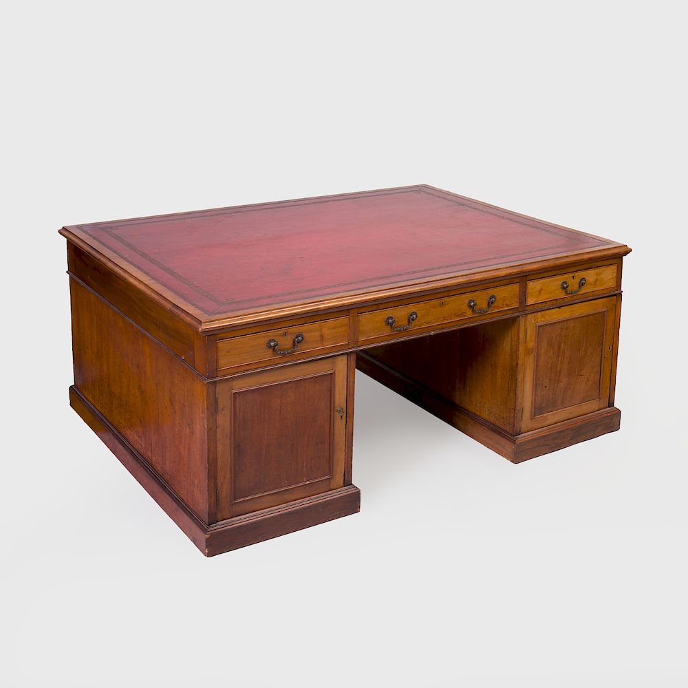 Appraisal: George III Mahogany Partner's Desk The leather-lined writing surface above