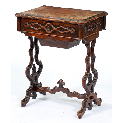 Appraisal: A Victorian serpentine walnut work table the top in quarter