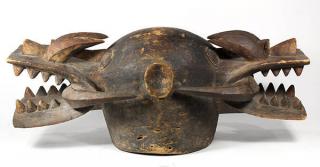 Appraisal: West African Senufo Ivory Coast carved double-headed firespitter helmet mask