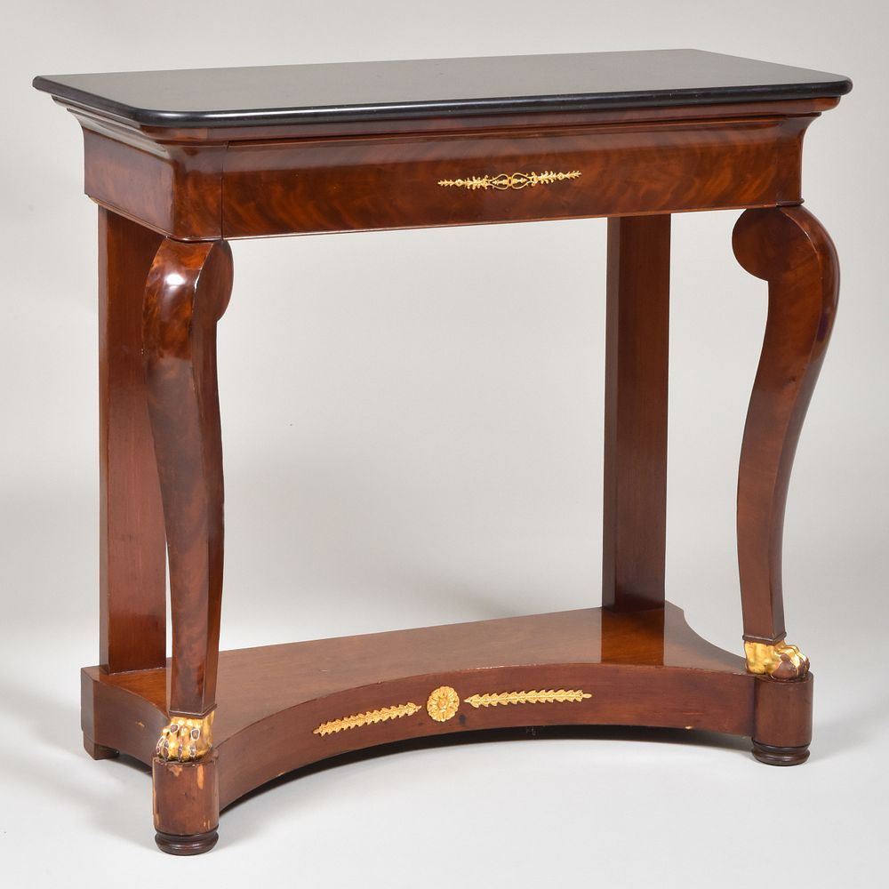 Appraisal: Louis Philippe Ormolu-Mounted Mahogany Console Table Fitted with a fossilized