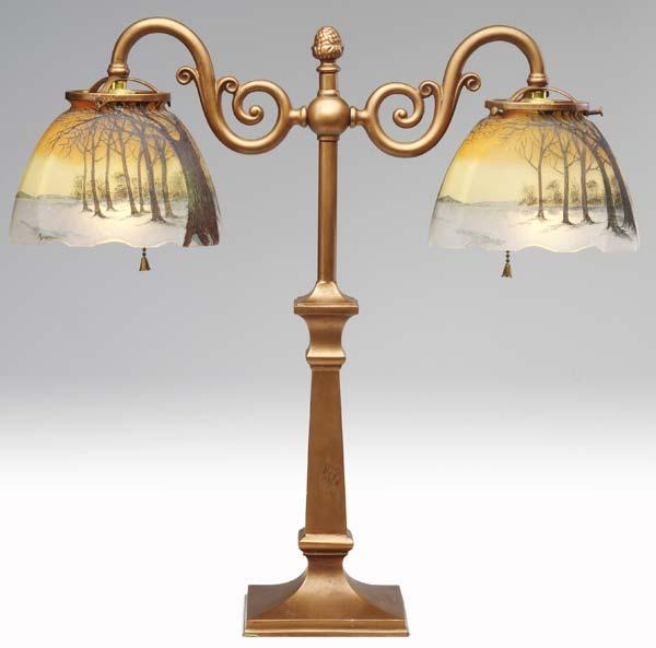 Appraisal: HANDEL Double student lamp each shade painted with winter landscape