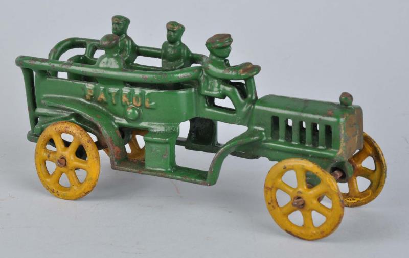 Appraisal: Cast Iron Patrol Wagon Has molded driver and three molded