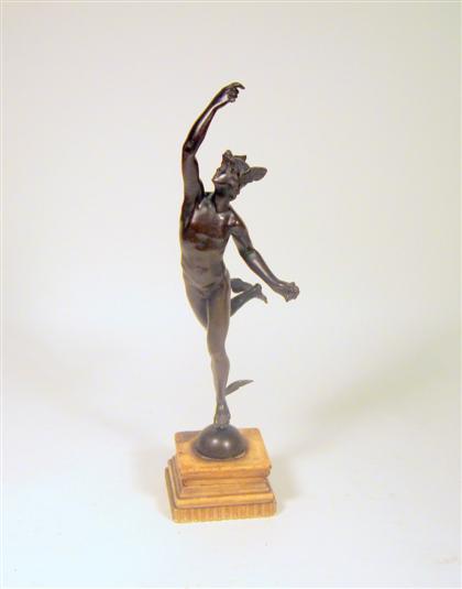 Appraisal: Continental bronze figure of mercuryDark brown patina modeled with arm