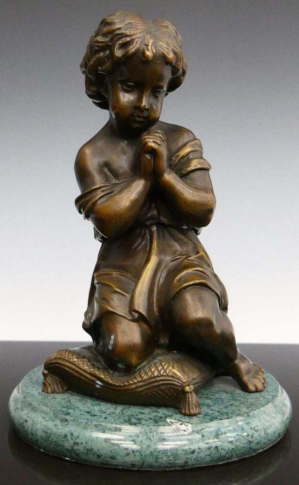 Appraisal: BRONZE FIGURINE OF A YOUNG GIRL PRAYING Measures about tall