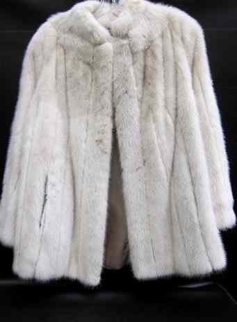 Appraisal: LADY'S MINK COAT blush dyed fur having three clasp closures