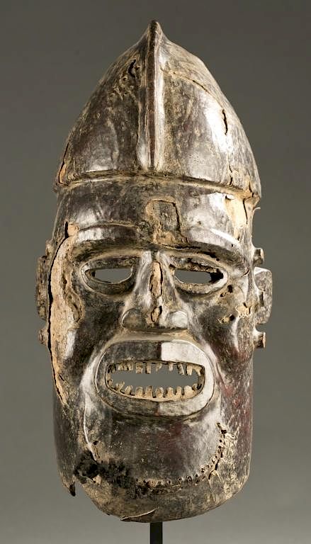 Appraisal: Ejagham skin covered helmet mask A Cross River wooden skin