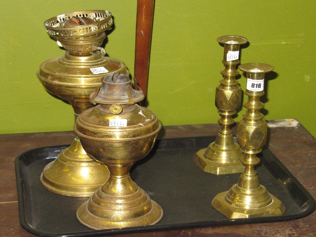 Appraisal: Lot comprising two brass oil lamps and a pair of