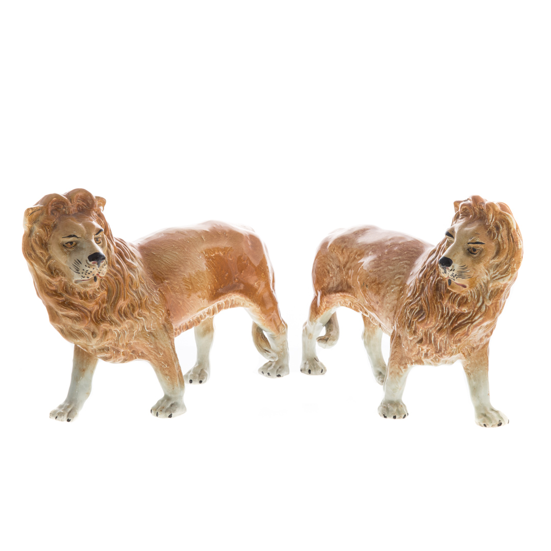 Appraisal: Pair of Staffordshire earthenware lions th century in H in