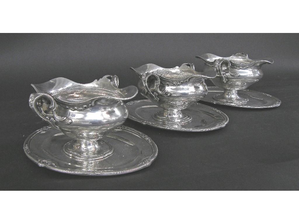 Appraisal: Set of three French rococo double lipped sauce boats on