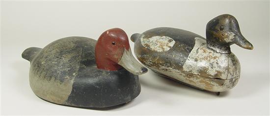 Appraisal: Two Hand-Carved Working Duck Decoys Both with attached heads and