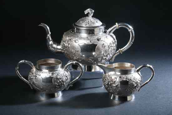 Appraisal: CHINESE SILVER THREE-PIECE TEA SET late th early th century