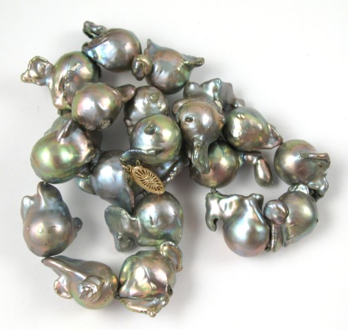 Appraisal: FRESHWATER BAROQUE PEARL NECKLACE strung with gray baroque pearls with