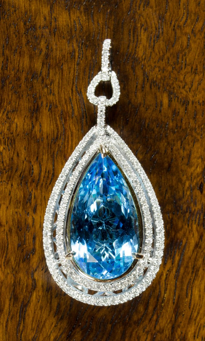 Appraisal: BLUE TOPAZ AND EIGHTEEN KARAT GOLD PENDANT The white gold