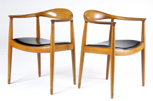 Appraisal: HANS WEGNER JOHANNES HANSEN Pair of teak The Chair with