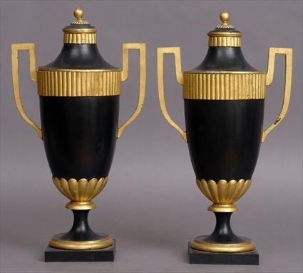 Appraisal: PAIR OF NEOCLASSICAL-STYLE BLACK-GROUND T LE PEINTE URNS AND COVERS