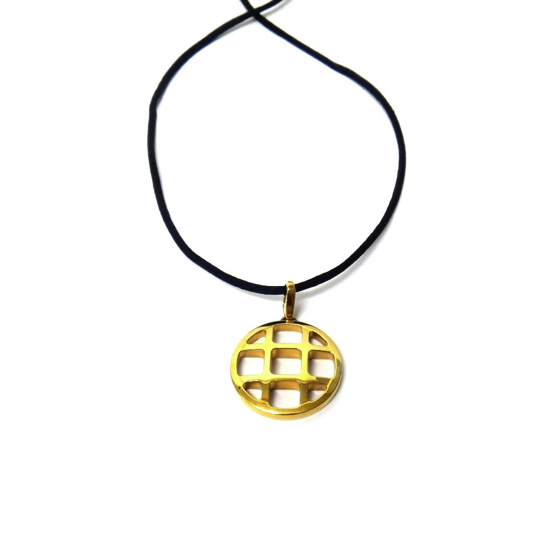 Appraisal: A Cartier ct yellow gold circular pendant in a cross