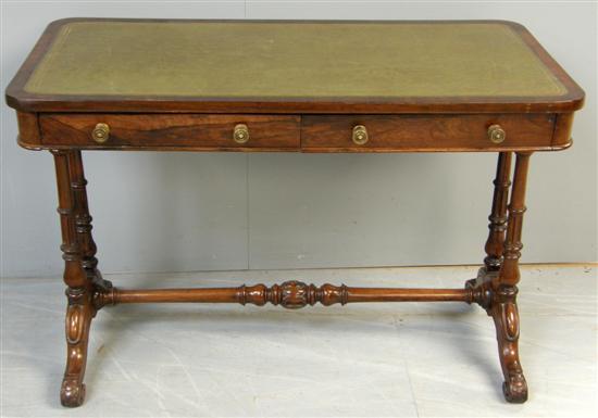 Appraisal: Victorian rosewood writing table with green inset leather top over