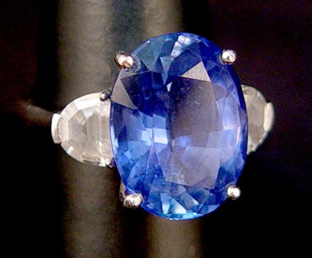 Appraisal: PLATINUM CT SAPPHIRE RING WITH DIAMONDS Platinum ring with a