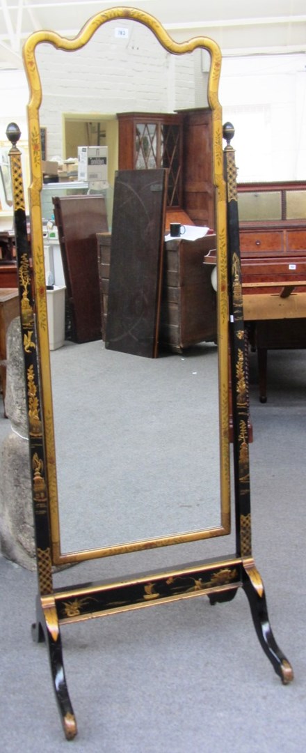 Appraisal: A th century cheval mirror with shaped gilt painted frame