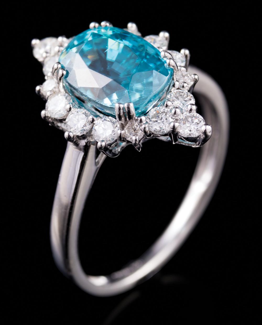 Appraisal: Platinum Blue Zircon and Diamond Ring center oval mixed cut