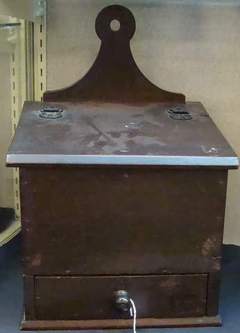 Appraisal: Sloping hinged lid compartmented drawer at bottom with wood pull