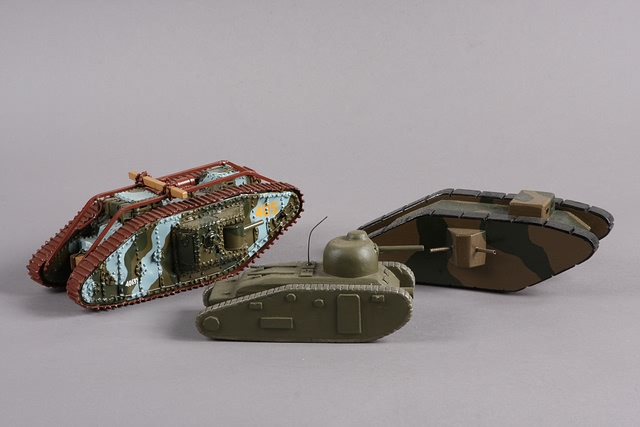 Appraisal: Lot of one metal and wooden WWI tanks