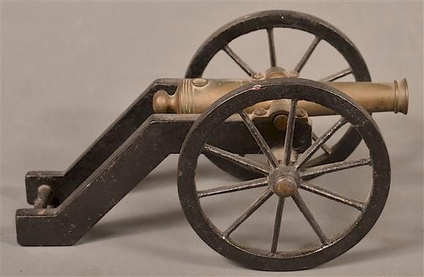 Appraisal: Vintage Cast Iron and Brass Miniature Cannon Vintage Cast Iron