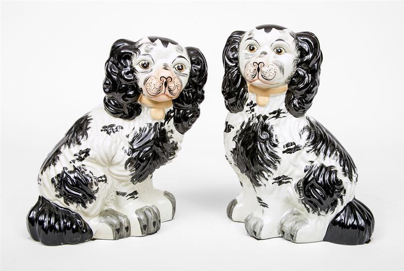 Appraisal: Assembled Pair of Staffordshire Black-Spotted Seated Spaniels th Century x