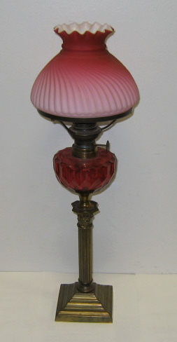 Appraisal: GERMAN LATE TH CENTURY OIL LAMP Bohemian cranberry glass font