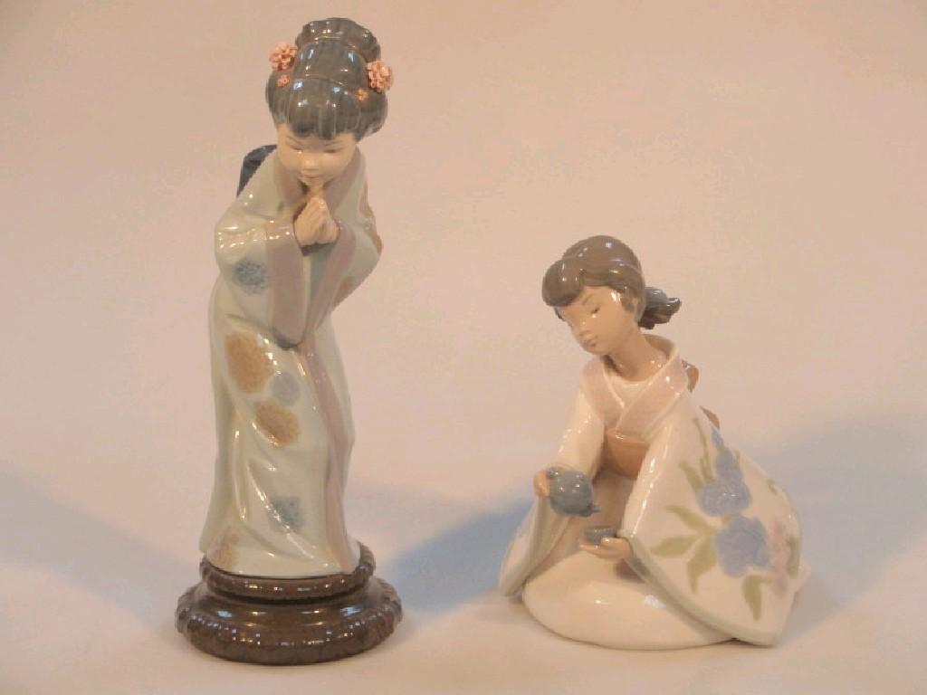 Appraisal: A Lladro geisha girl figure cm high and a Nao