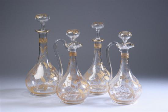 Appraisal: FOUR GILT-ETCHED GLASS DECANTERS circa Each of bulbous form with