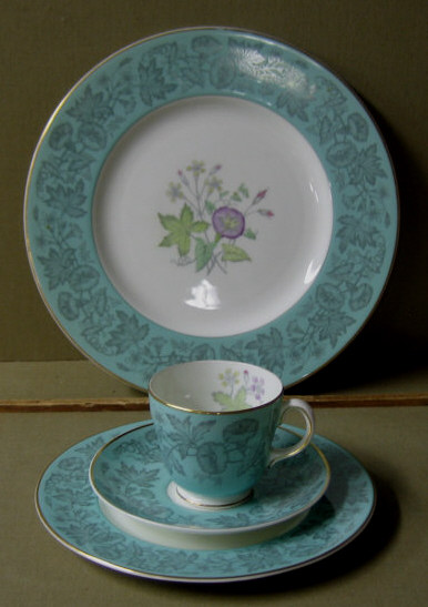 Appraisal: WEDGWOOD WILD FLOWER BONE CHINA Grey decoration on green borders