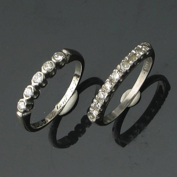 Appraisal: A set of two diamond bands one platinum one k