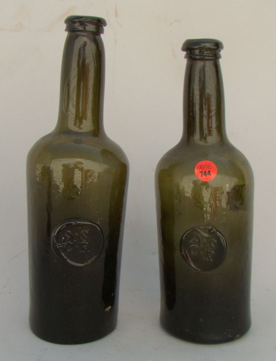 Appraisal: TWO ANTIQUE ENGLISH DARK GREEN GLASS SEAL BOTTLES Seal A