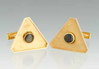 Appraisal: A Pair of Gold and Black Star Sapphire Cufflinks k