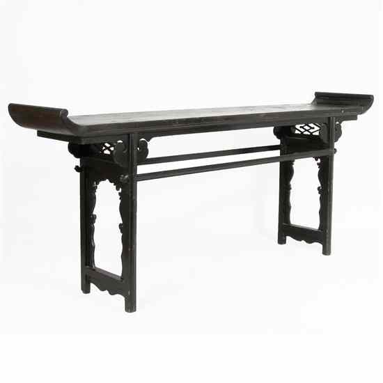 Appraisal: A Chinese Fruitwood Trestle-Leg Altar Table circa having everted flanges