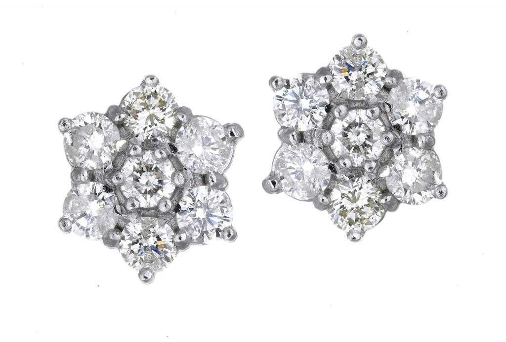 Appraisal: A PAIR OF DIAMOND CLUSTER EARRINGS of hexagonal shape in