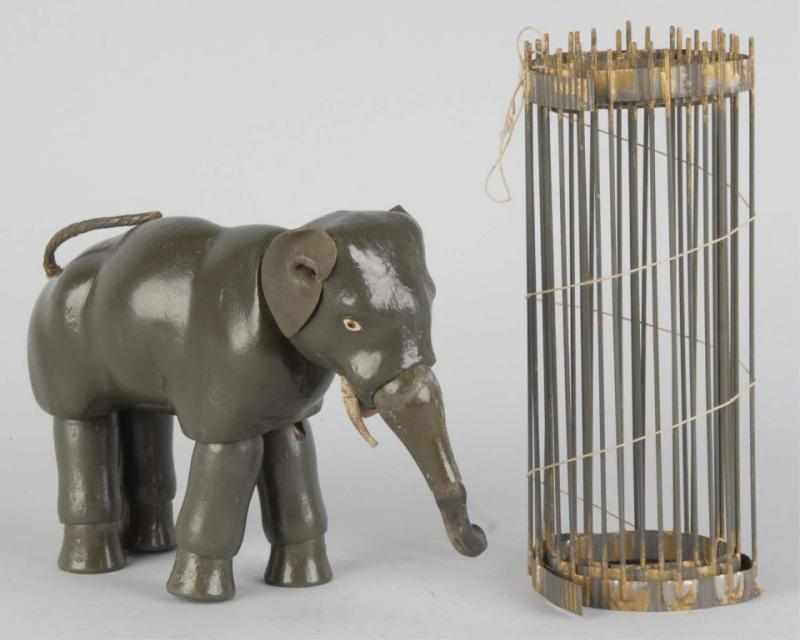 Appraisal: Schoenhut Painted-Eye Elephant Cage Enclosures Description Includes two wire cage