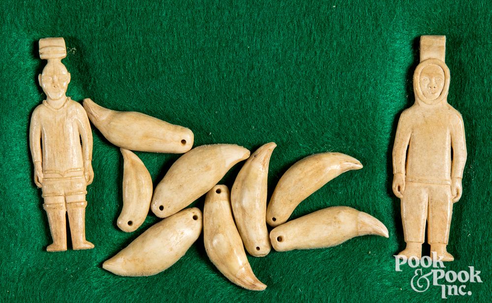 Appraisal: Inuit carved bone figures drilled sea lion teeth Inuit Indian