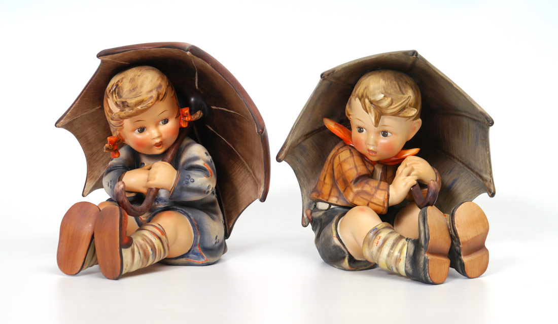 Appraisal: LARGE HUMMEL UMBRELLA BOY AND GIRL ''h Boy incised over