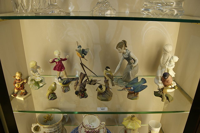 Appraisal: A COLLECTION OF SEVEN ROYAL WORCESTER MODEL BIRDS a Lladro