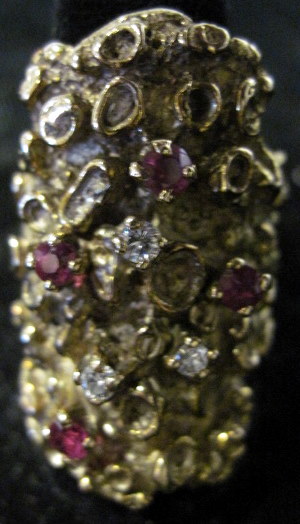 Appraisal: karat yellow gold diamond and ruby ringSet with three petite