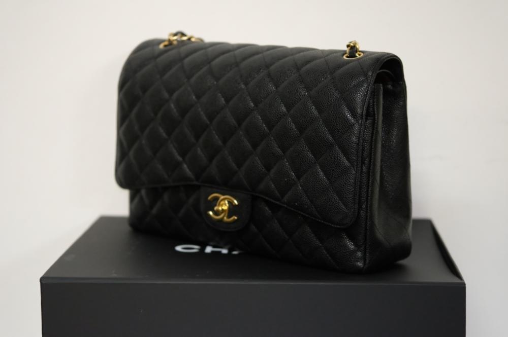 Appraisal: JUMBO BLACK CHANEL FLAP BAGChanel jumbo black calfskin Flap Bag