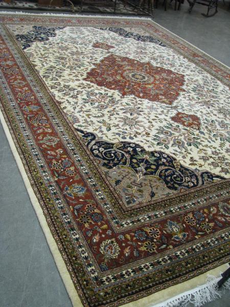 Appraisal: An Indo-Tabriz Oriental rug approximately x ivory field with rust