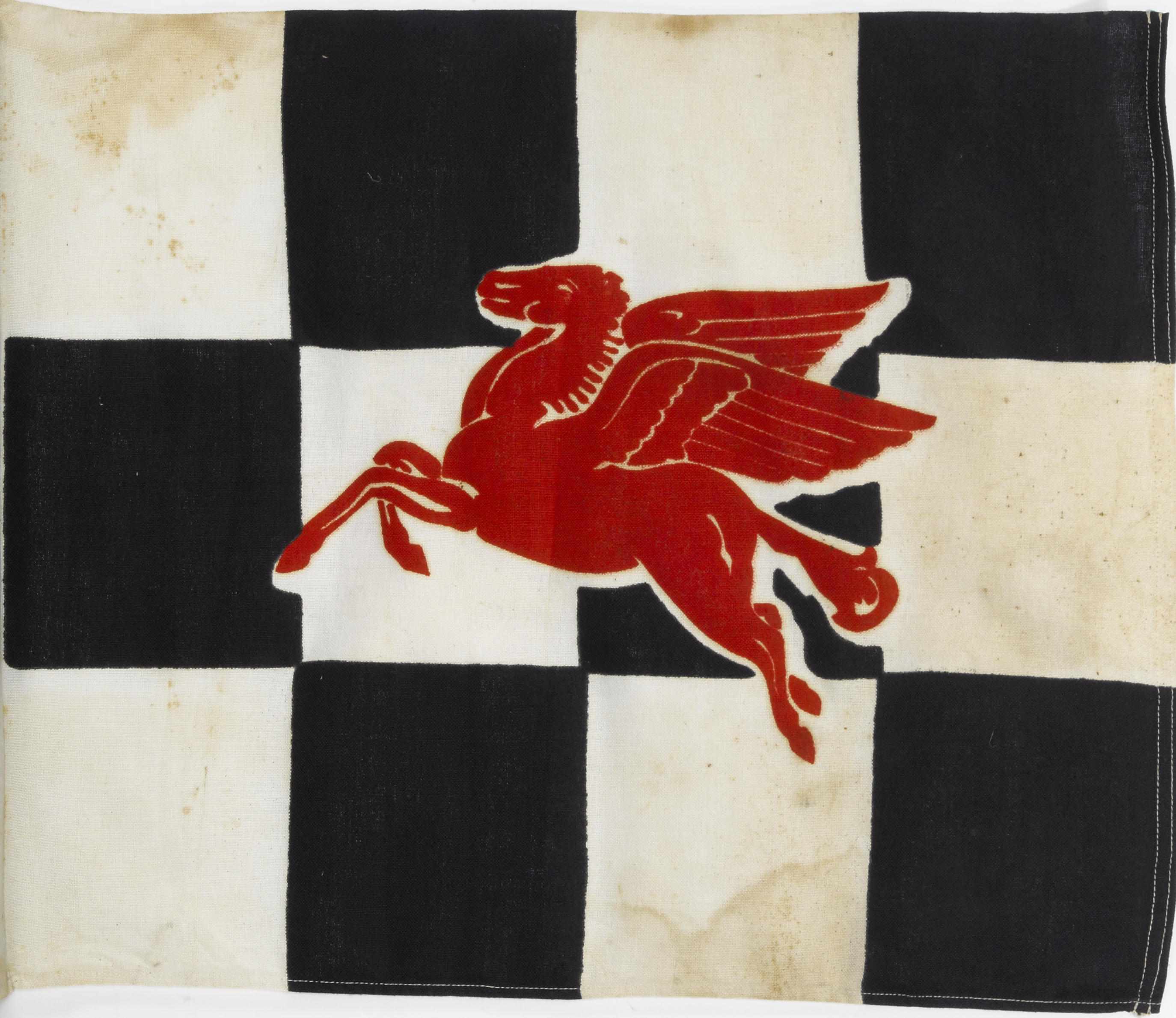 Appraisal: A Mobil Pegasus checkered flag black white and red fabric